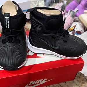 New In Box. Nike Kids Black and White snow Boots